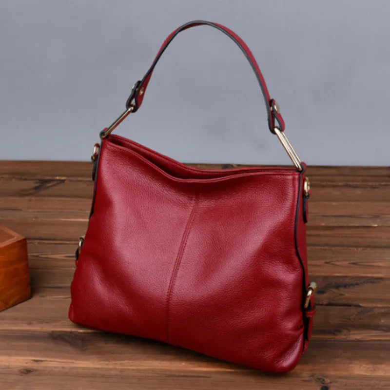 Genuine leather crossbody bag in vertical square shape with internal phone and document compartments