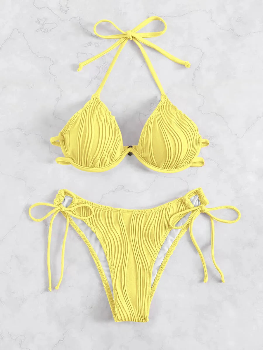 Women's apricot coloured bikini swimsuit with steel underwire bracket on a mannequin.