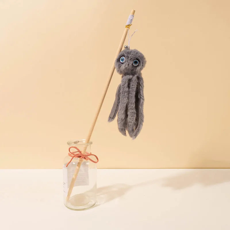 Octopus-themed cat toy with long stick handle and moving eyes for indoor play with kittens