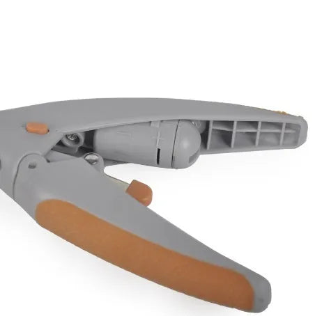 White and blue dog nail clipper with a visible blood line indicator window and a separate safety guard on a blister card.