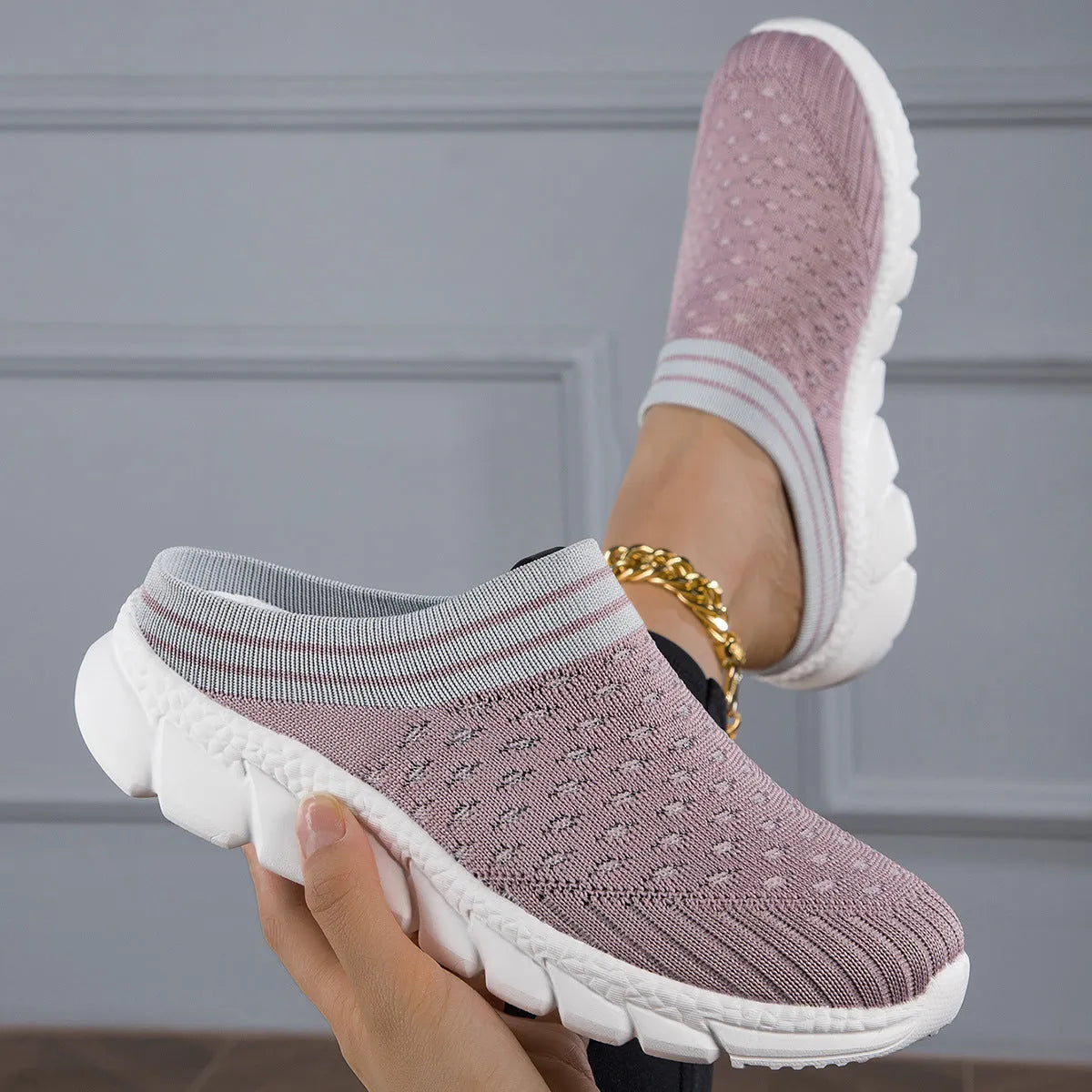 Women's striped Flyknit slipper shoes in black, pink, or purple with hollowed-out sewing line details