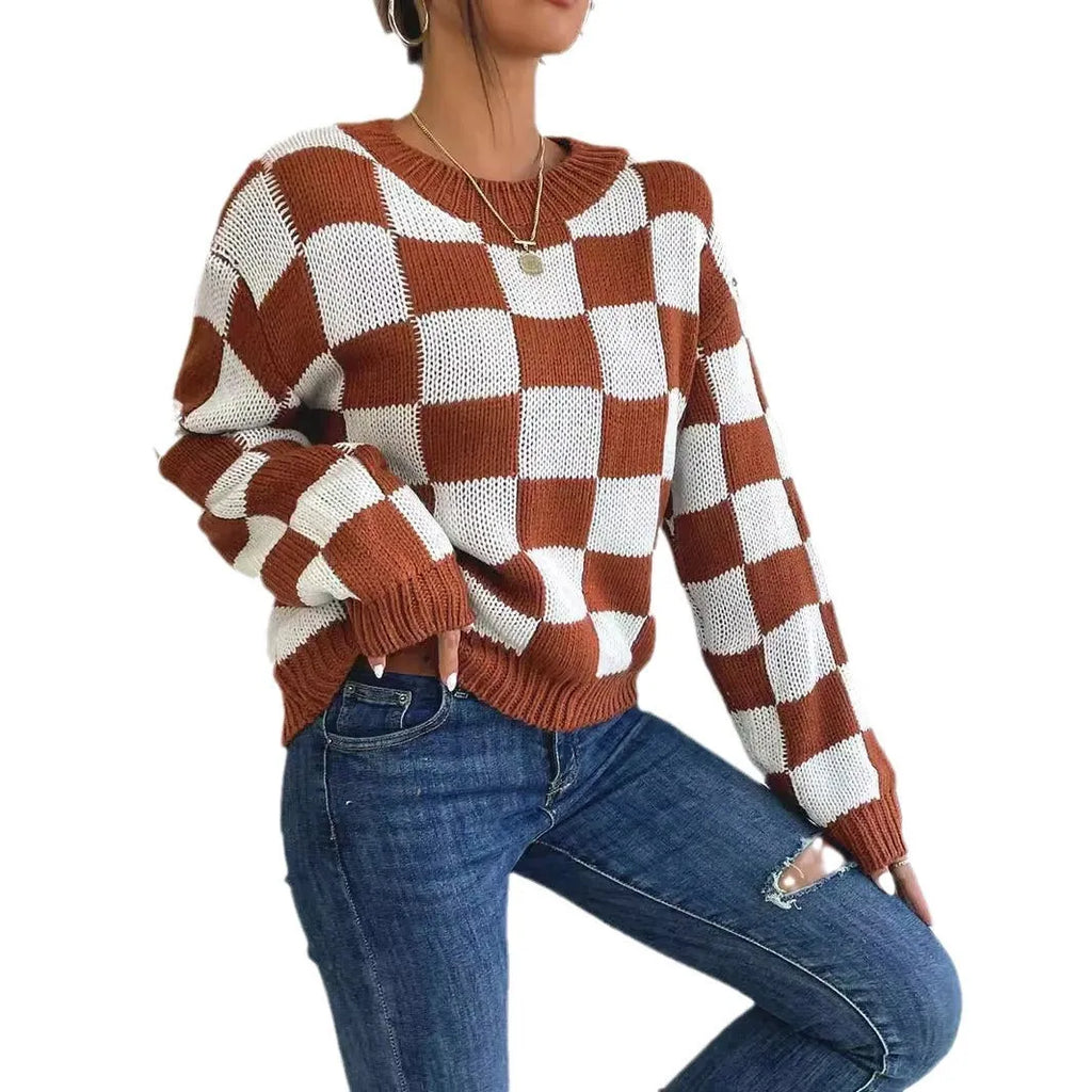 Dark brown plaid acrylic pullover sweater with round neck and long sleeves on hanger