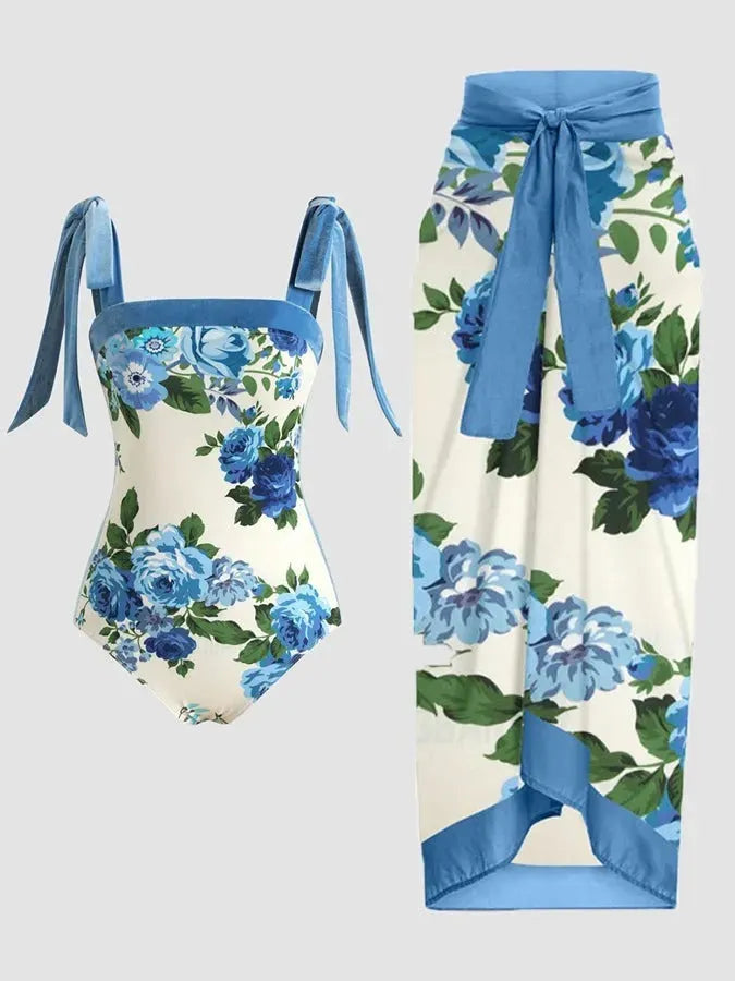 Women's printed chiffon two-piece swimsuit set with a separate hip skirt.