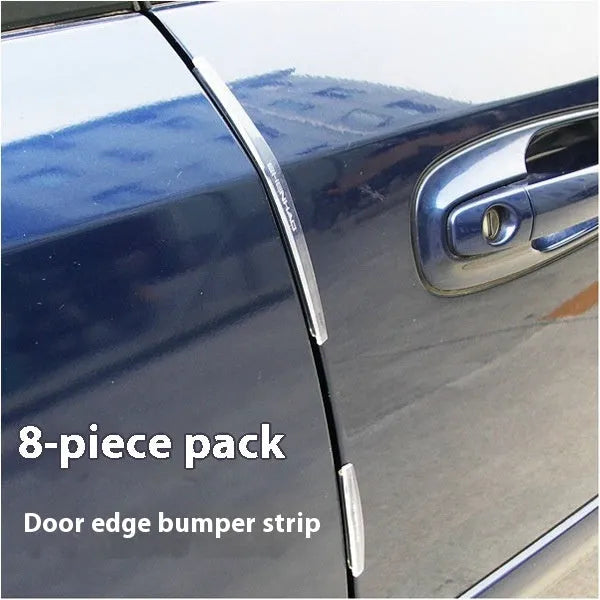 White plastic car door edge bumper strip on a vehicle door for anti-collision protection.