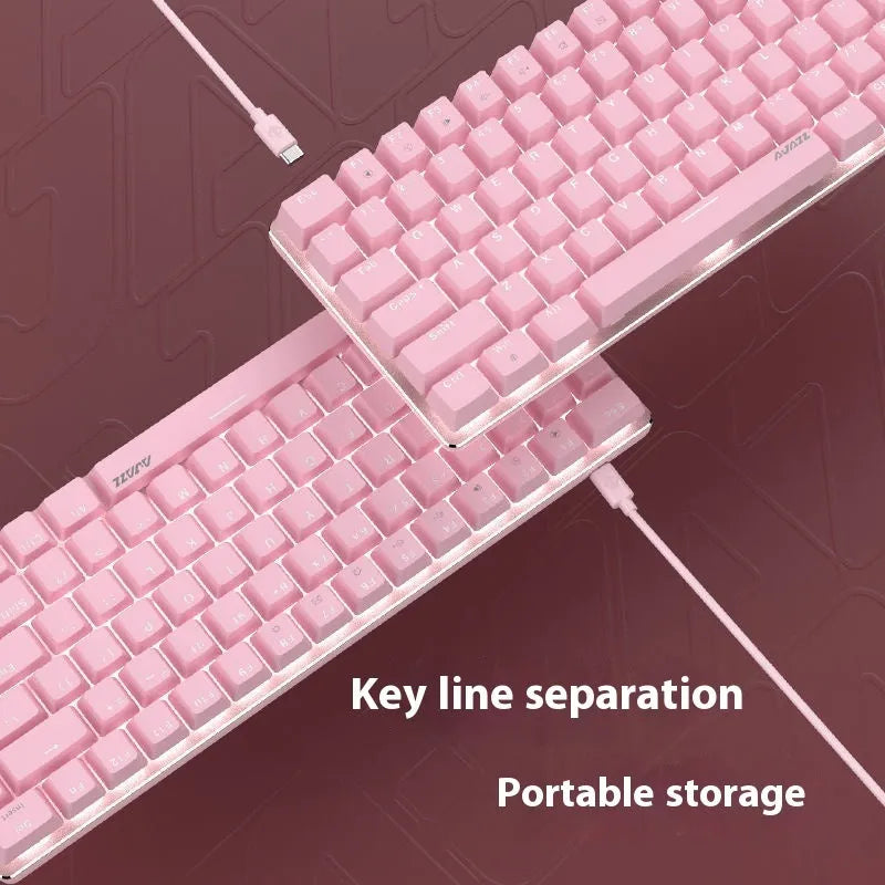 82-key mechanical keyboard with white backlight and metal construction beside laptop