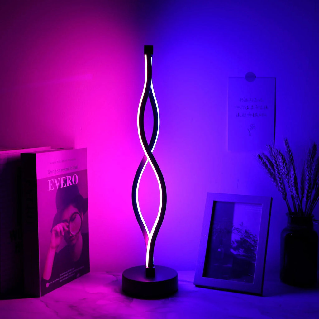 Black aluminium desk lamp with touch dimming controls and three-colour adjustment button