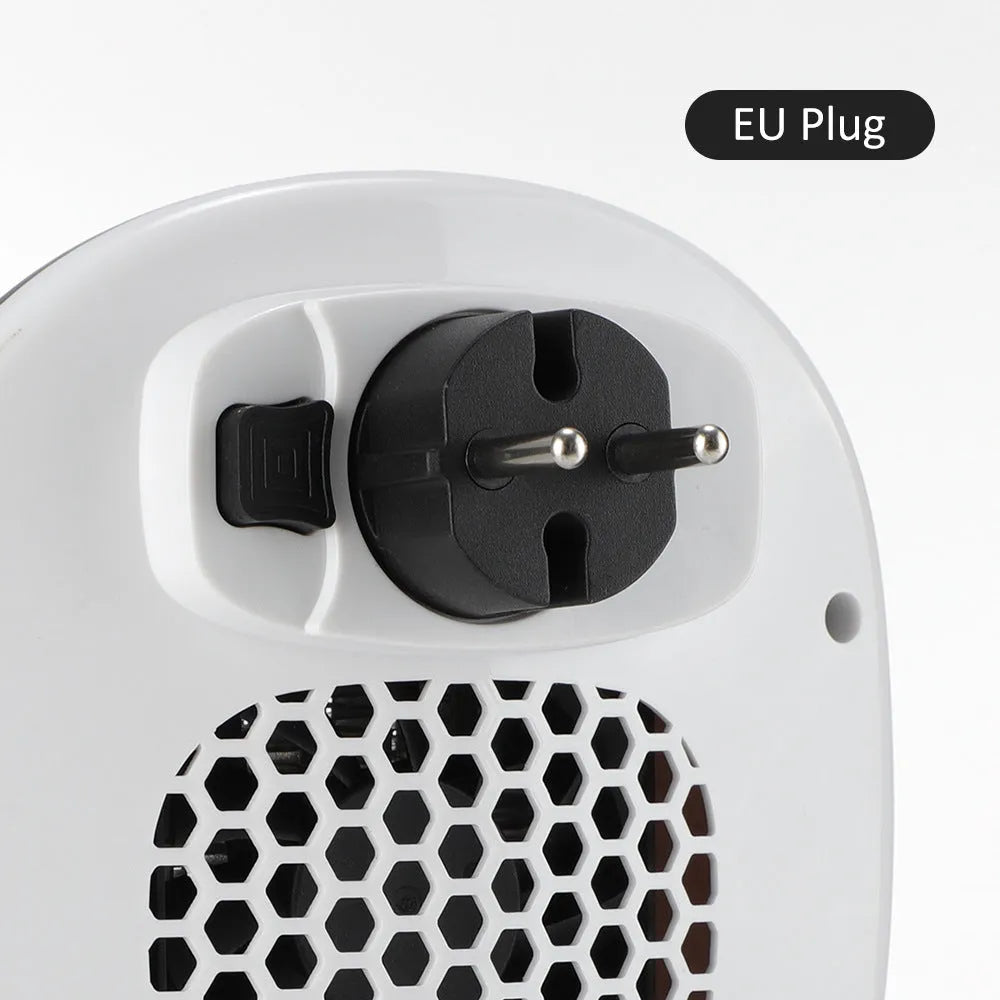 White ceramic heating electric hot air blower heater with remote control on table