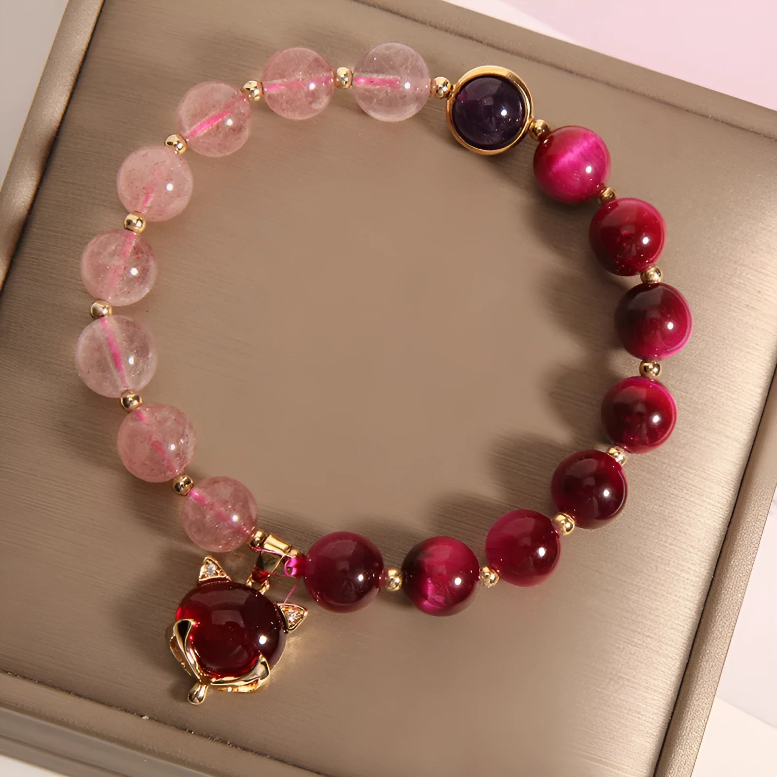Simple strawberry crystal bracelet for women on a black elastic rope, 18cm long.