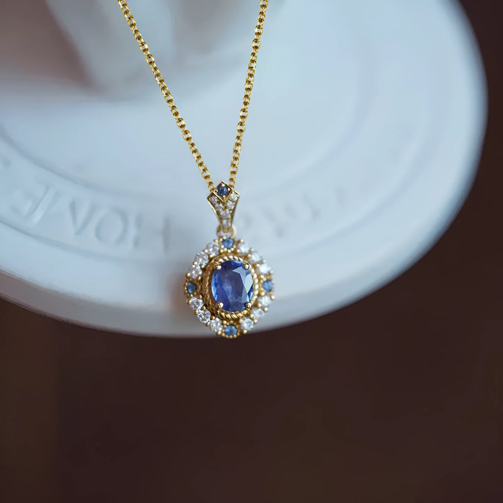 Yellow gold colour royal style necklace with zircon inlaid pendant on an adjustable copper box chain.