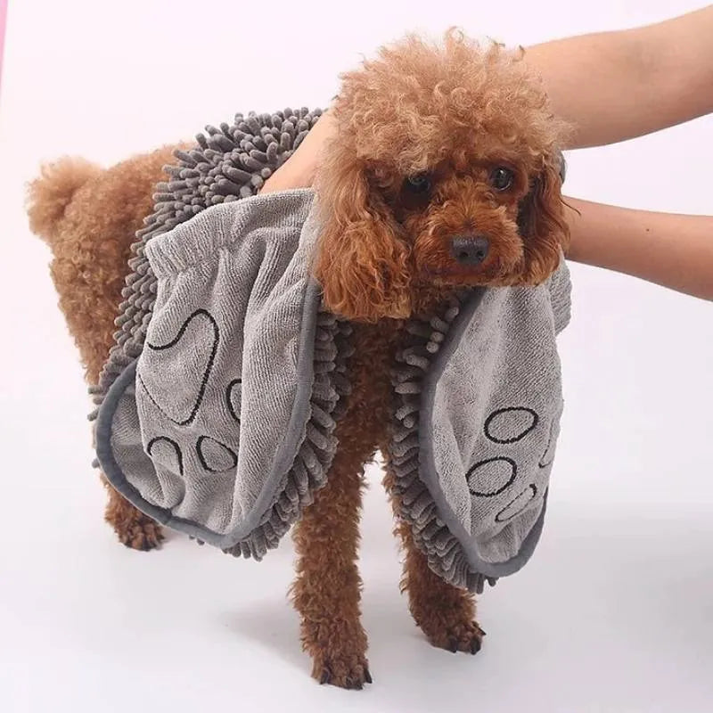 Blue soft fibre pet bath robe towel laid flat, showing its size next to a dog silhouette.