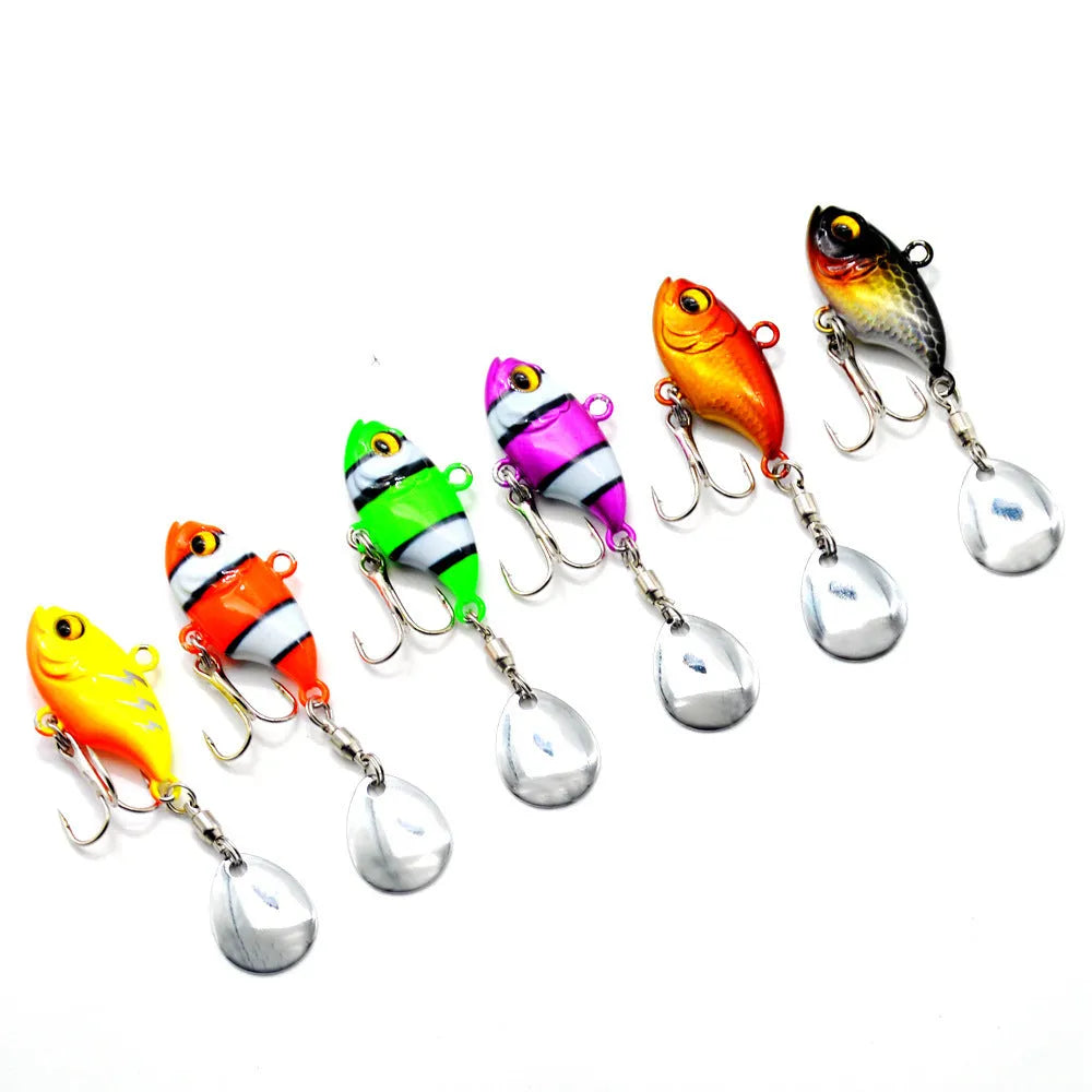 Metal sea fishing lure with rotating sequin in gold colour option