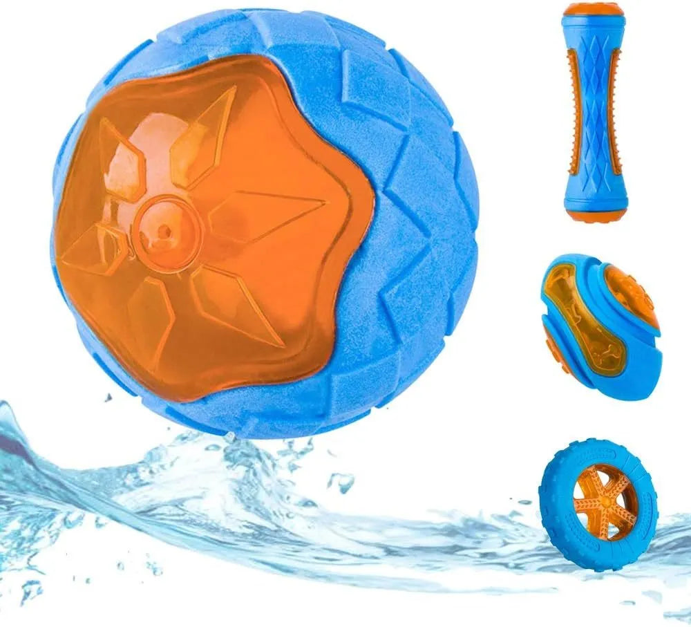 Set of four floating TPR dog toys: a squeaky ball, barbell, and two tires for water fetch.