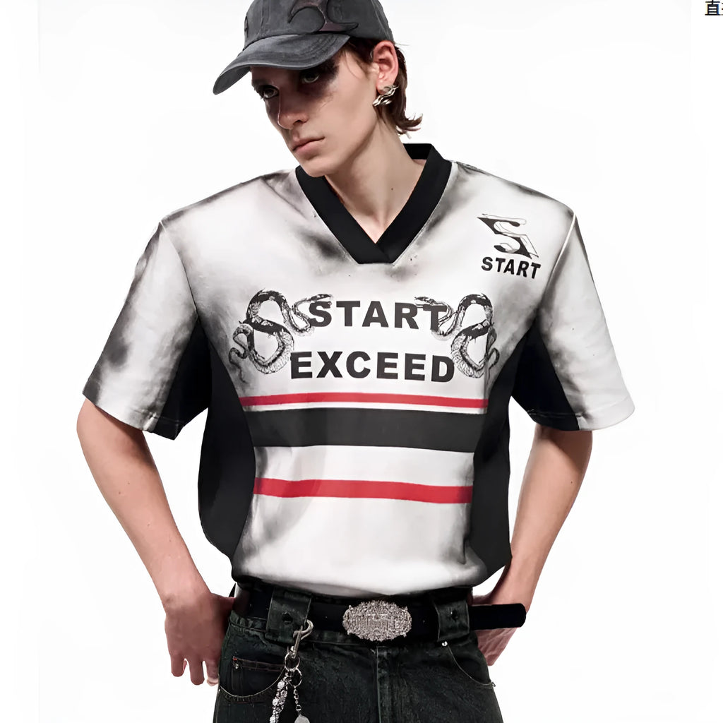 Women's black V-neck short sleeve top with white letter snake pattern print and padded shoulders.