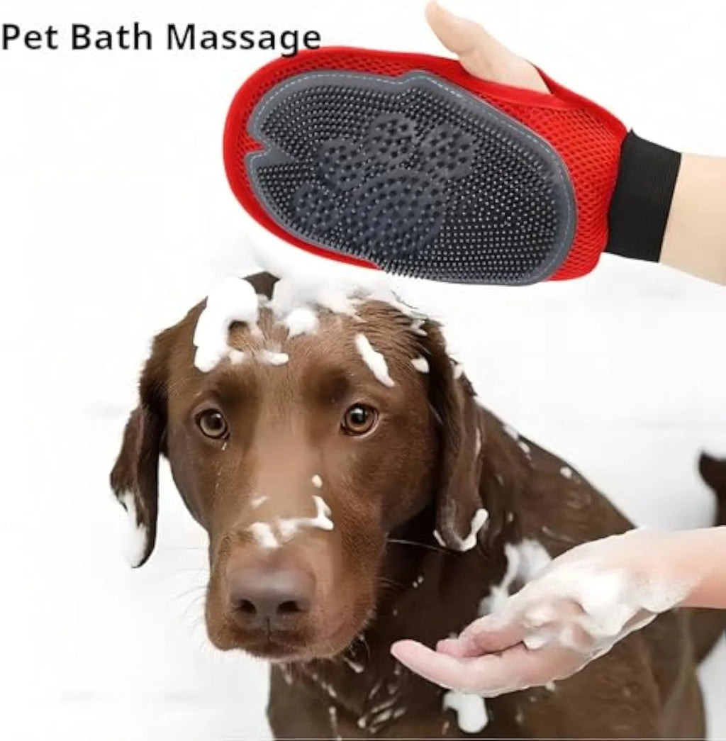 Red pet bathing and grooming glove with an integrated cleaning brush on the palm.