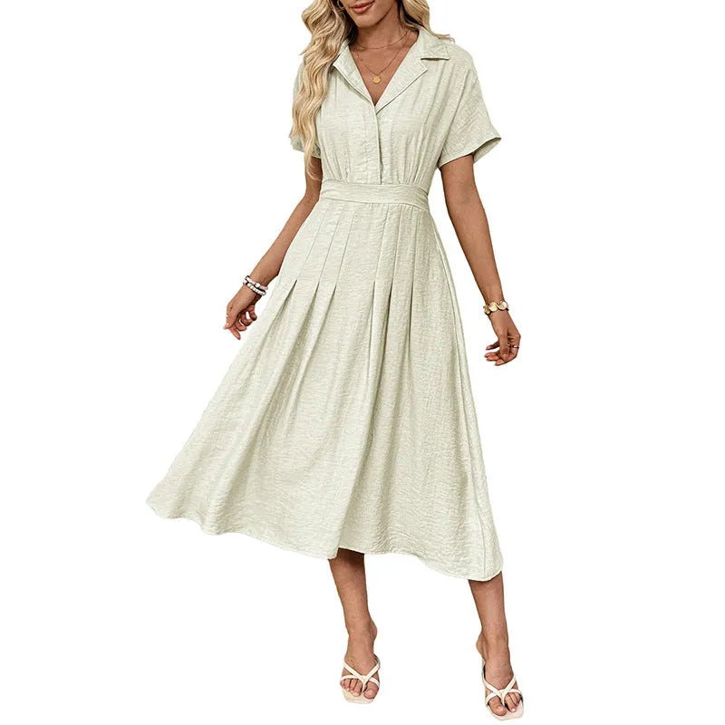 Light green women's shirt dress with lapel collar, waist tie, and skirt pocket on a hanger.