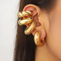 Women's geometric ear clip set in gold and silver colours with clip-on design