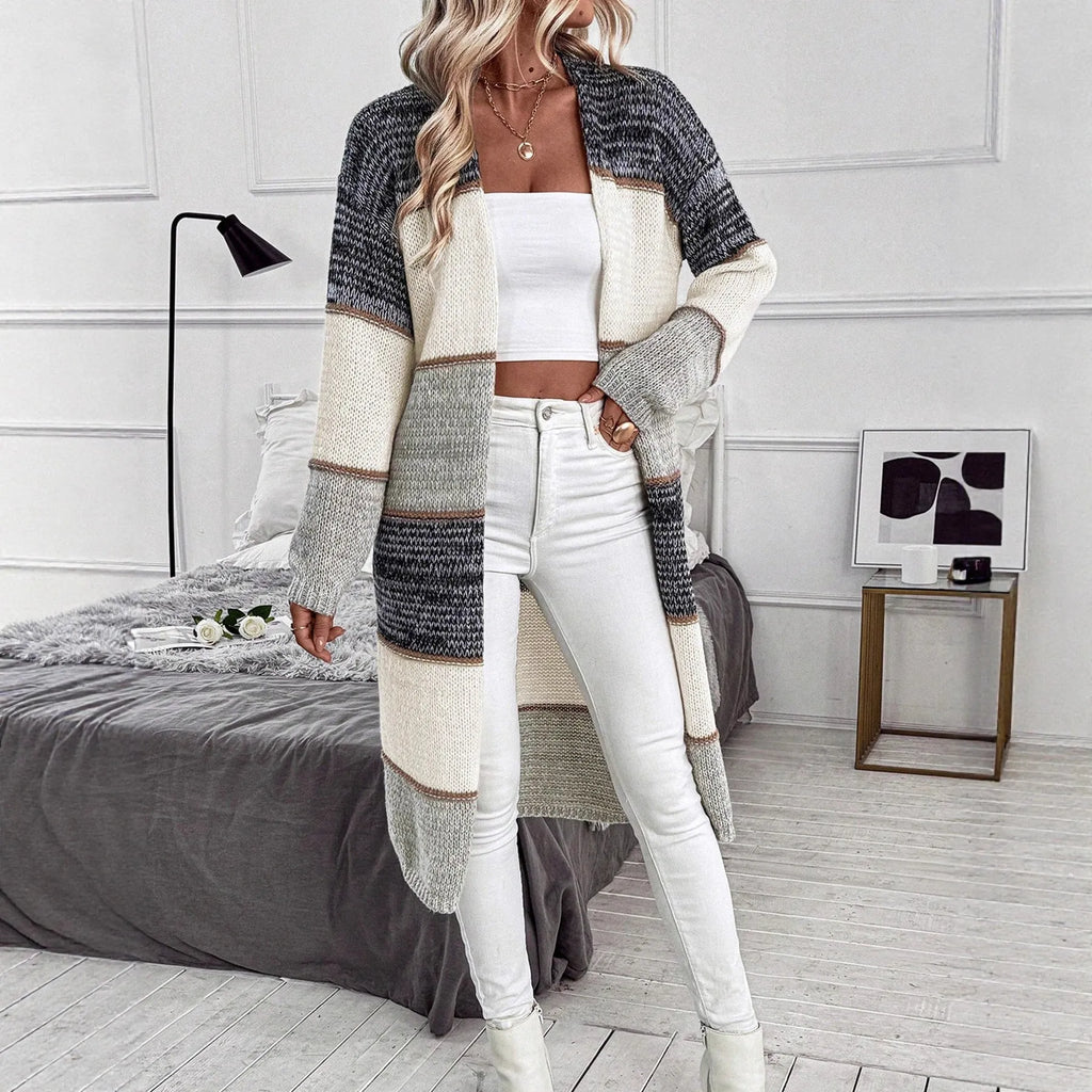 Grey stripes and plaid pattern on a women's loose fit knitted long cardigan with long sleeves.