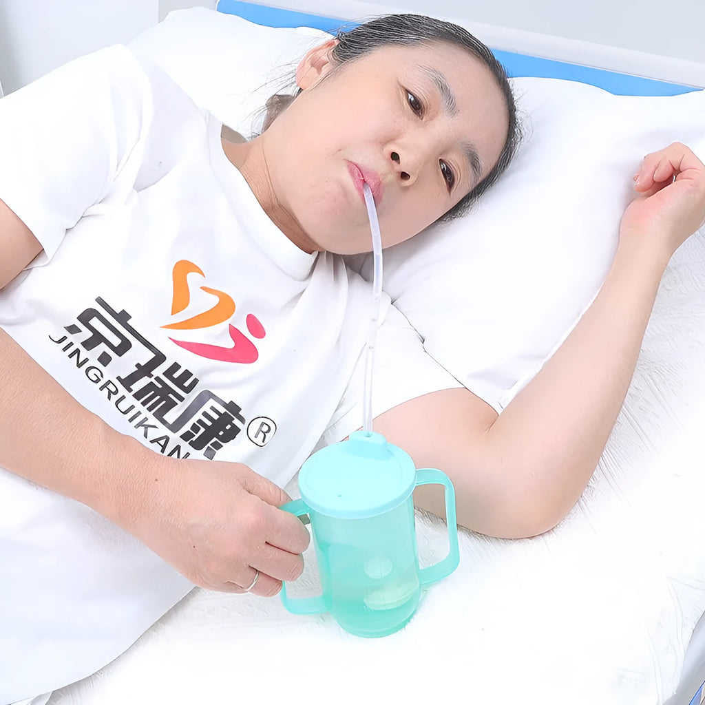 Oblique mouth bedside drinking cup with handle and optional wrist splint for elderly and pregnant users