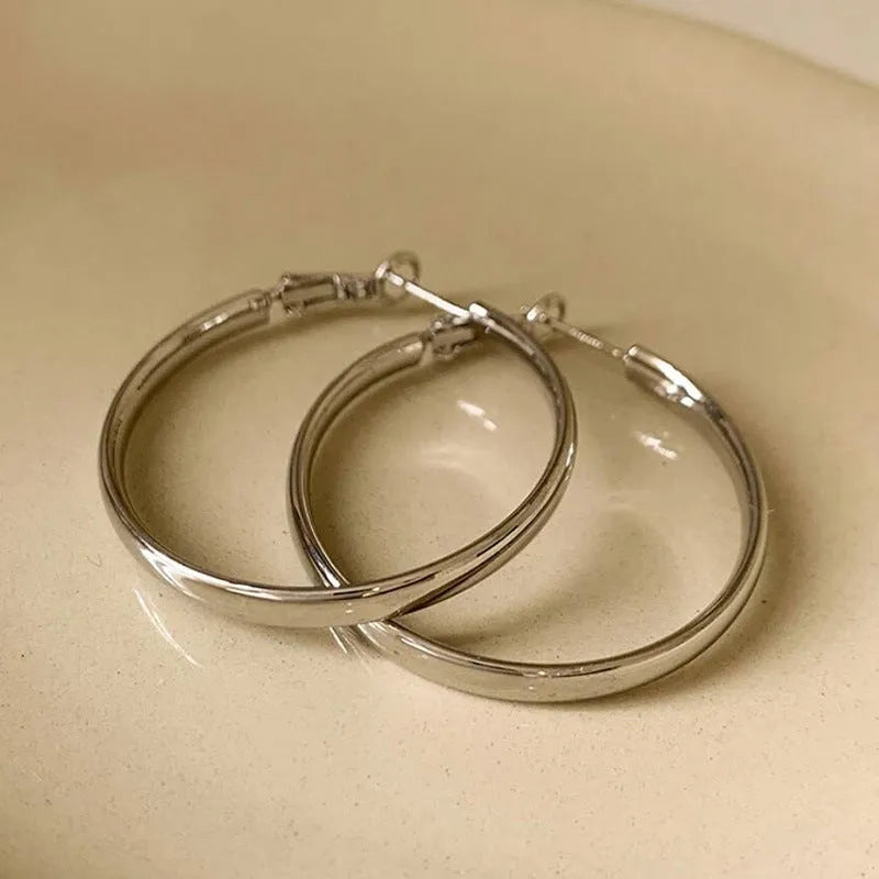 40mm diameter metal circle earrings in gold and silver electroplated finishes