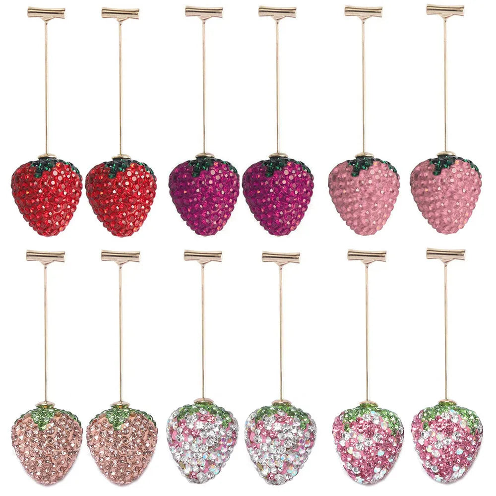 Red geometric strawberry earrings with spot drill detailing on zinc alloy