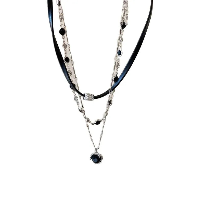 Women's creative multi-layer twin necklace set with heart-shaped leather and crystal pendants on adjustable chain