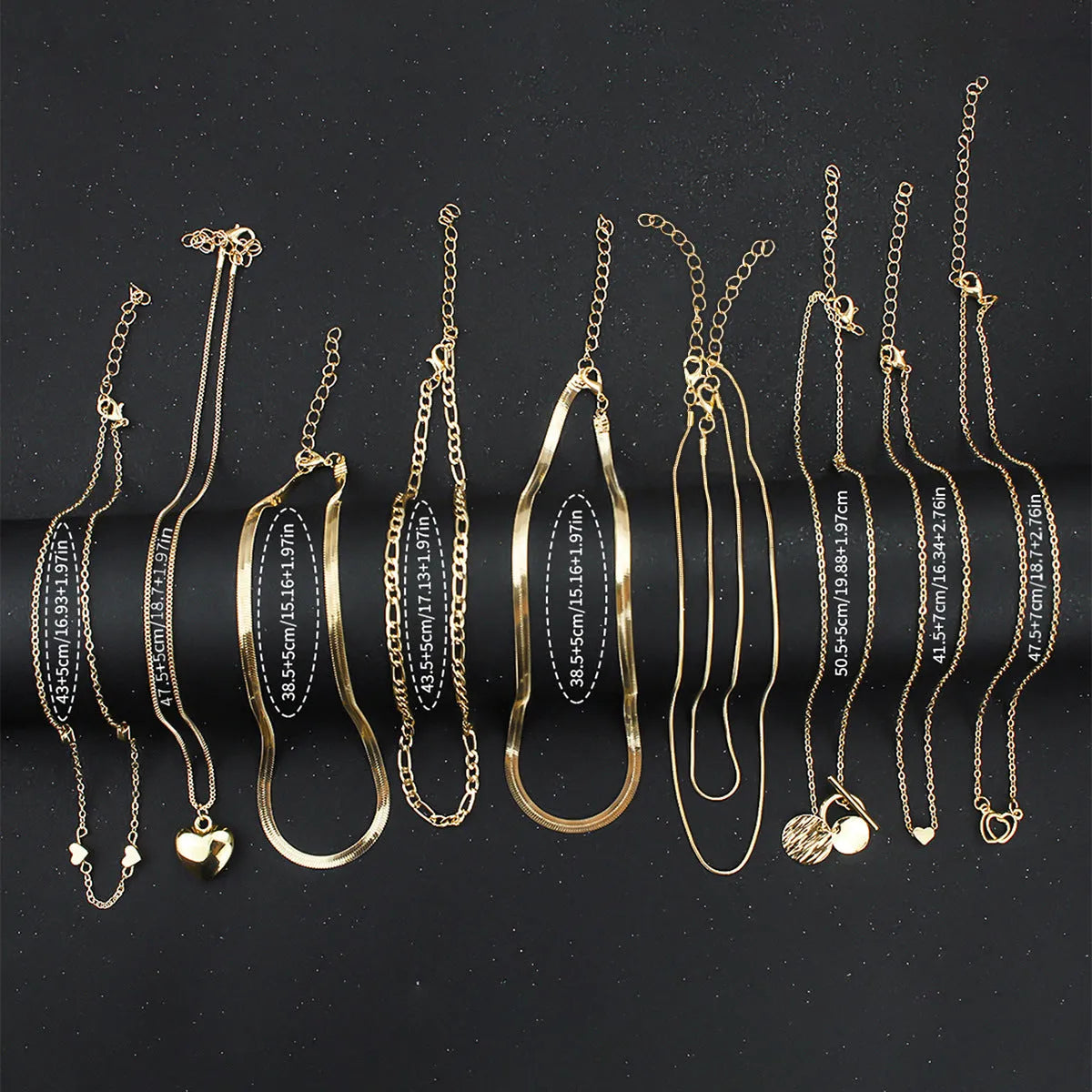 Ten gold electroplated necklaces with alloy pendants on snake bones chains, adjustable 21-50cm length