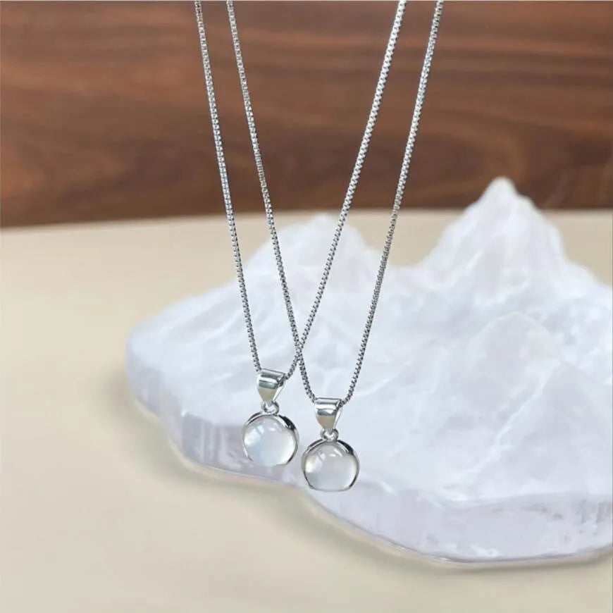 Women's geometric eight-pointed star pendant necklace on an adjustable box chain, moon light colour.