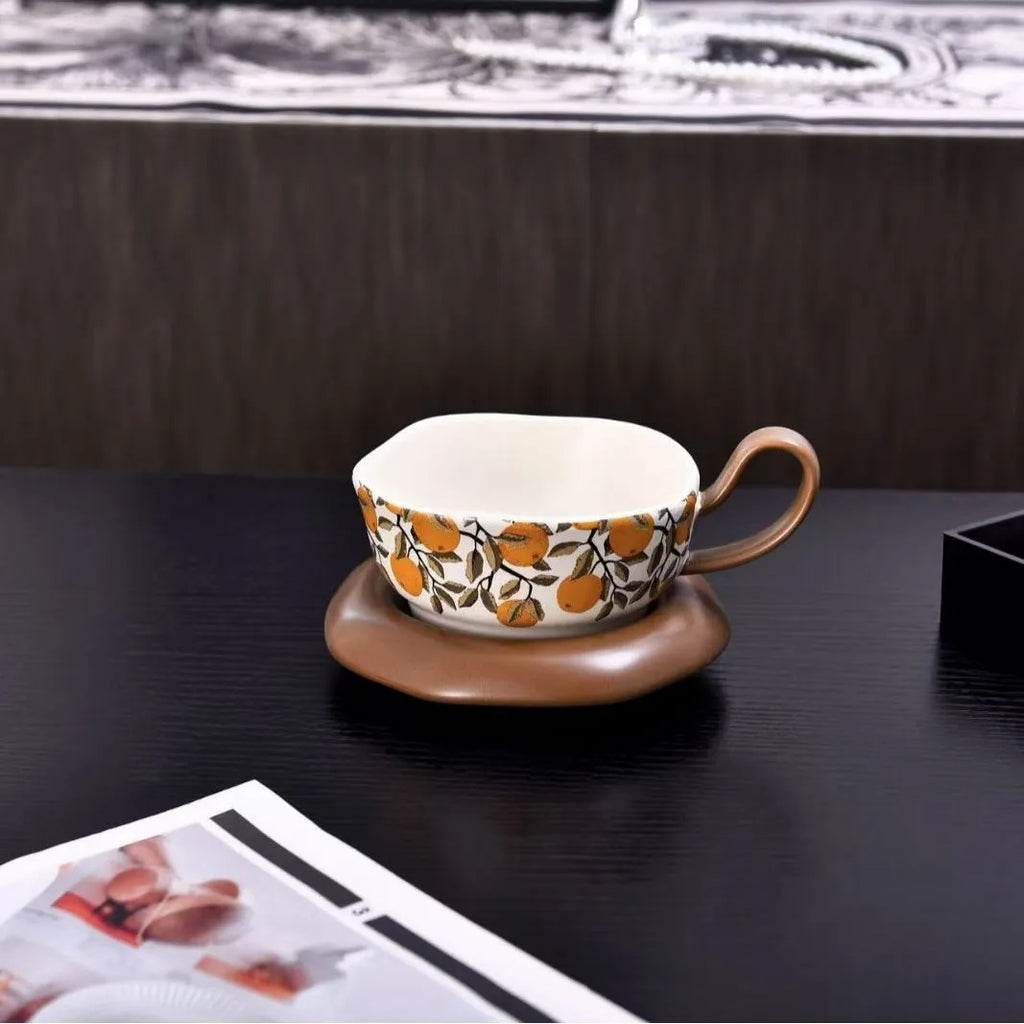 Antique style ceramic coffee cup and saucer set with 210ml capacity in black or orange retro design