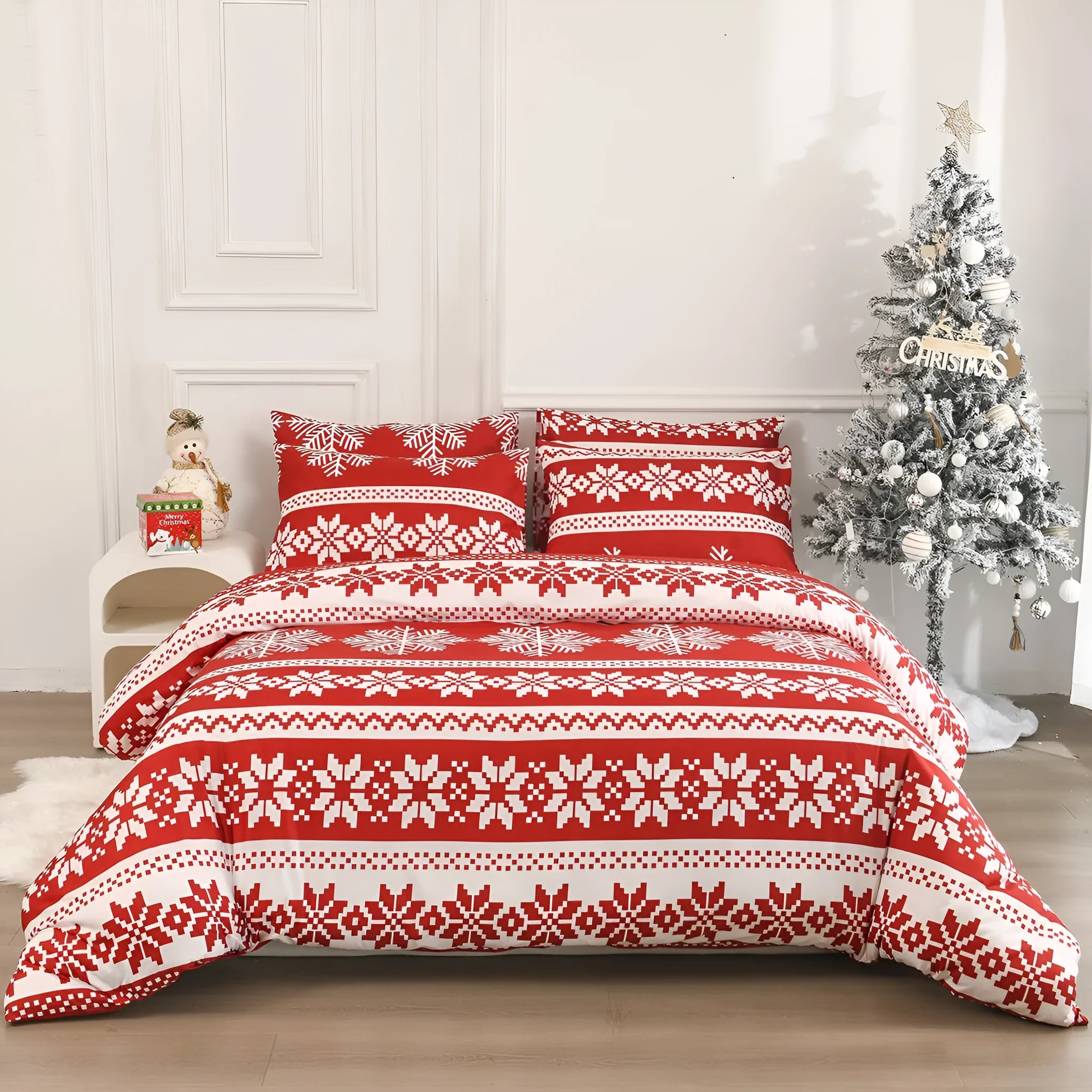 Red Christmas Love Song pattern duvet cover and pillowcases on a bed.