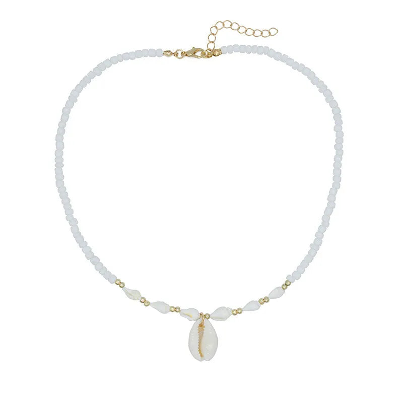 Women's white mother of pearl shell pendant necklace with regular chain on display