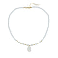 Women's white mother of pearl shell pendant necklace with regular chain on display