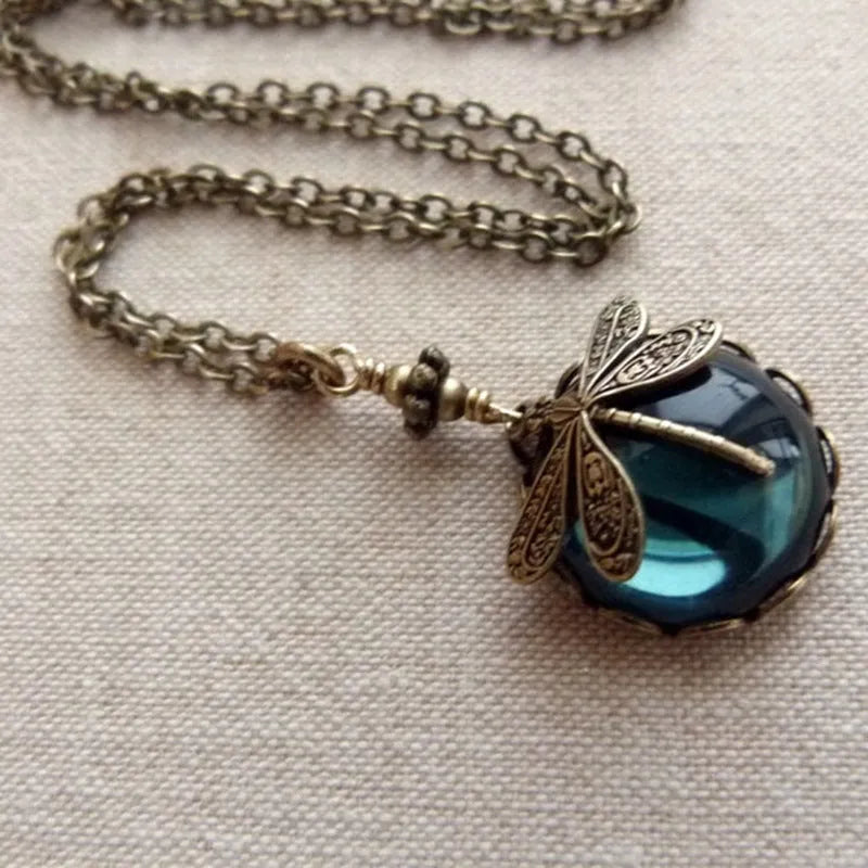 Hand carved dragonfly pendant necklace in vintage bronze finish on sterling silver chain
