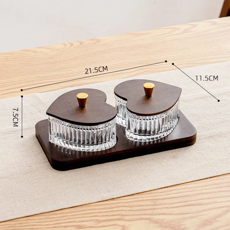 Glass retro style snack plate with heart-shaped transparent lid showing grid compartments inside