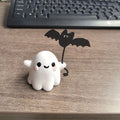 Small resin ghost walking dog Halloween statue ornament measuring 4cm