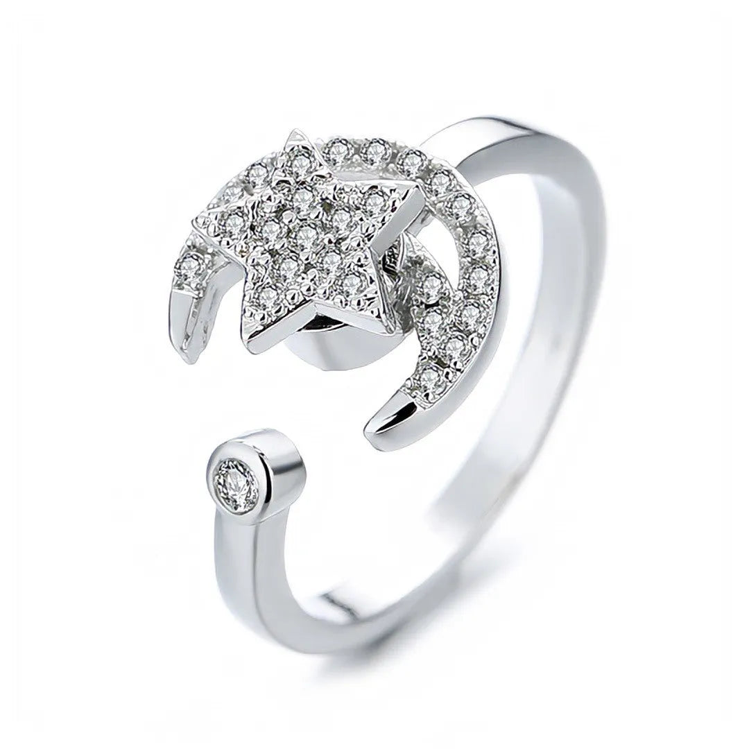 Micro-inlaid free rotating zircon star moon anti-anxiety ring in gold on white background