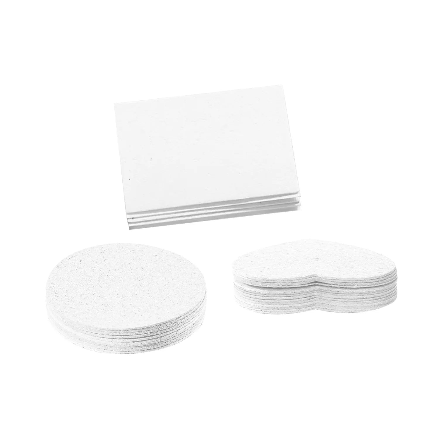 Painting sponge set showing heart, round, and square cellulose sponges with a stack of wood pulp paper for watercolour art.