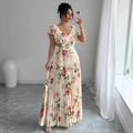 Apricot floral print dress with V-neck, ruffled sleeves, and pleated swing skirt