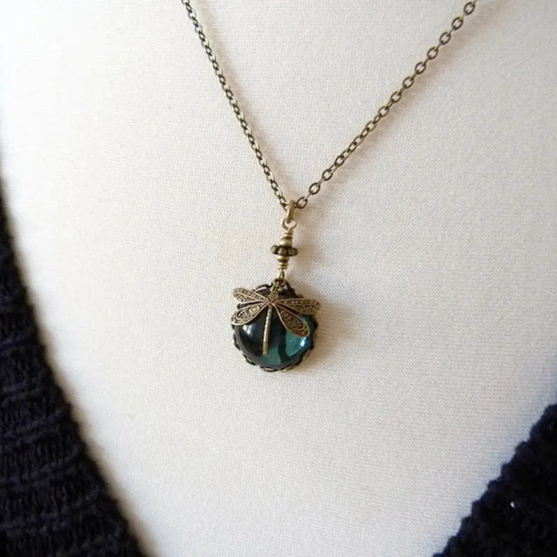 Hand carved dragonfly pendant necklace in vintage bronze finish on sterling silver chain
