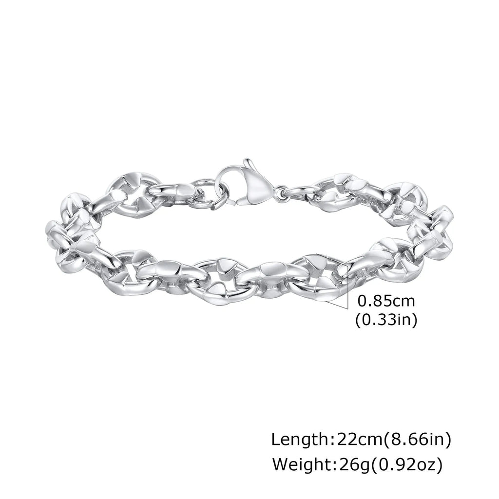Stainless steel thick geometric chain bracelet on a wrist, showing handmade links and steel colour finish.