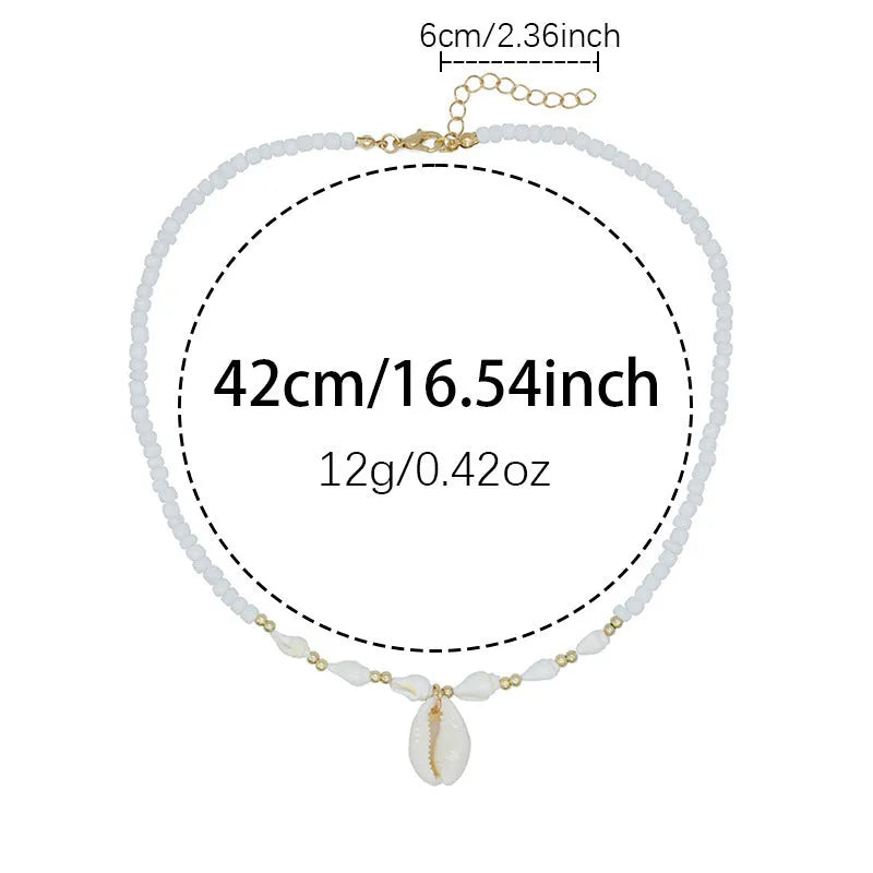 Women's white mother of pearl shell pendant necklace with regular chain on display