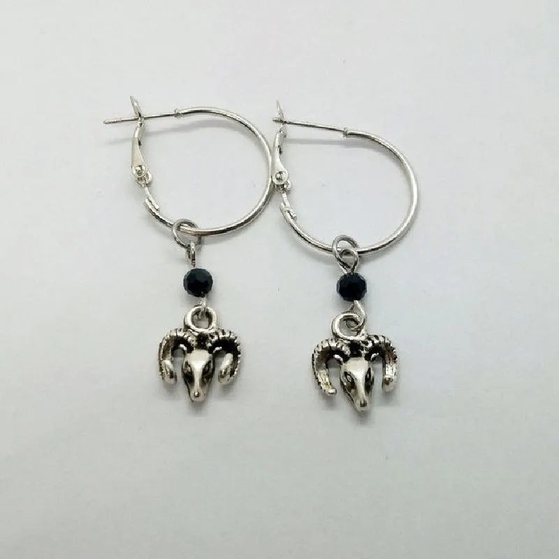 Silver round ring earrings with Tibetan antelope design on circular alloy frames