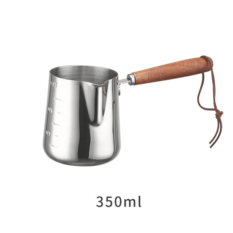 Stainless steel garland coffee cup with a scaled wooden handle shown in a simple, solid colour.