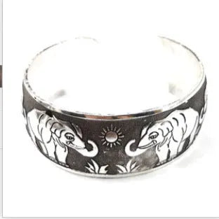 Ethnic carved open silver tone alloy bracelet with Roman shape in Turtle or Elephant colour option