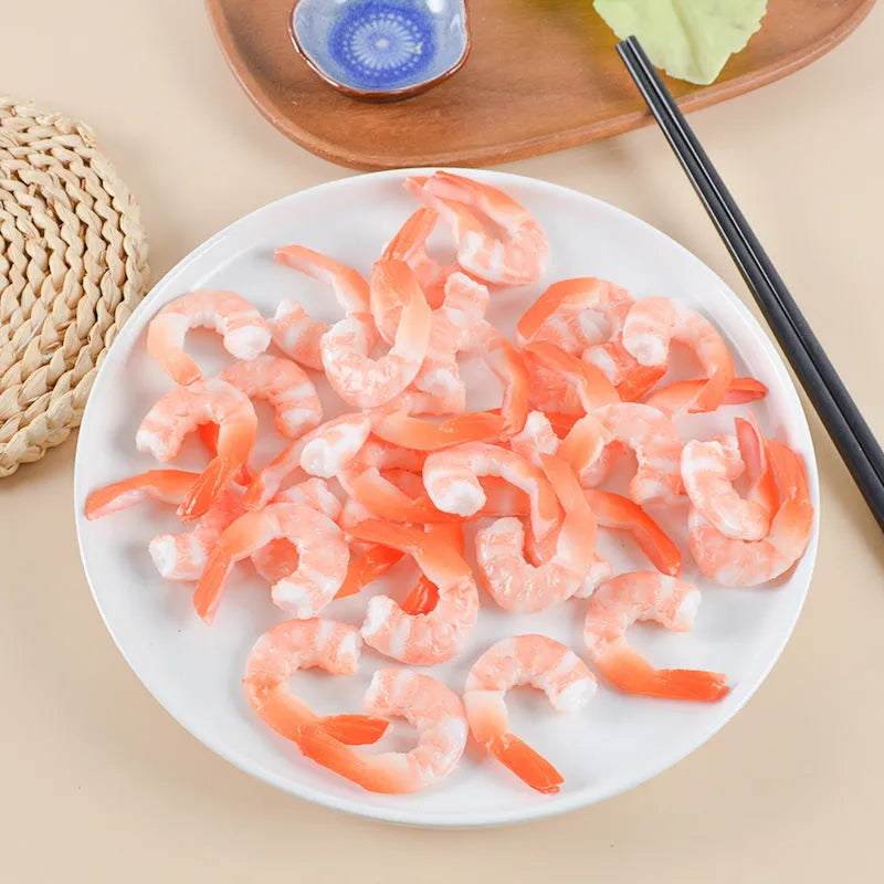 Realistic PVC shrimp-shaped keychain with door buckle attachment, shown against a white background.