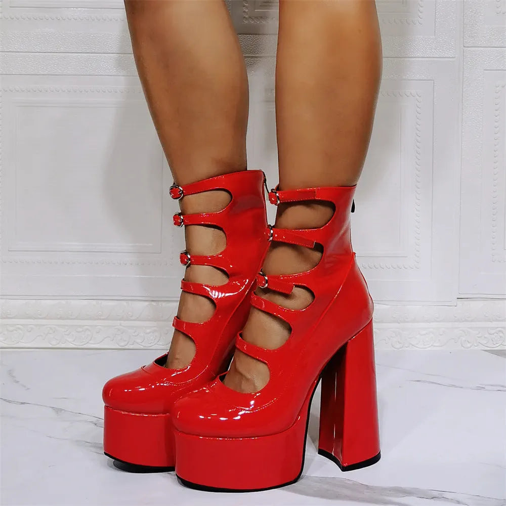 Black patent leather women's platform high heel boots with a thick heel and serpentine ankle buckle