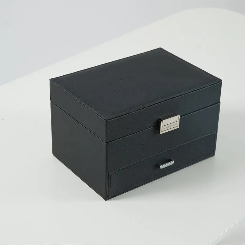 Solid colour hard PU leather jewelry storage box for earrings and necklaces.