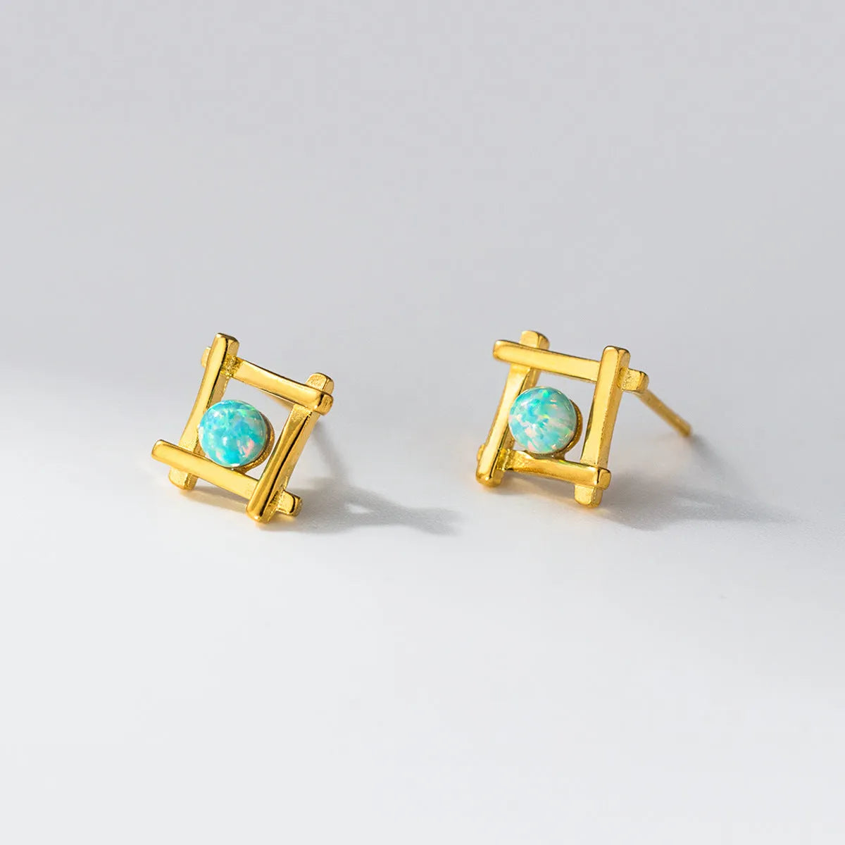 Geometric cross quadrangle stud earrings in sterling silver with gold or silver plating