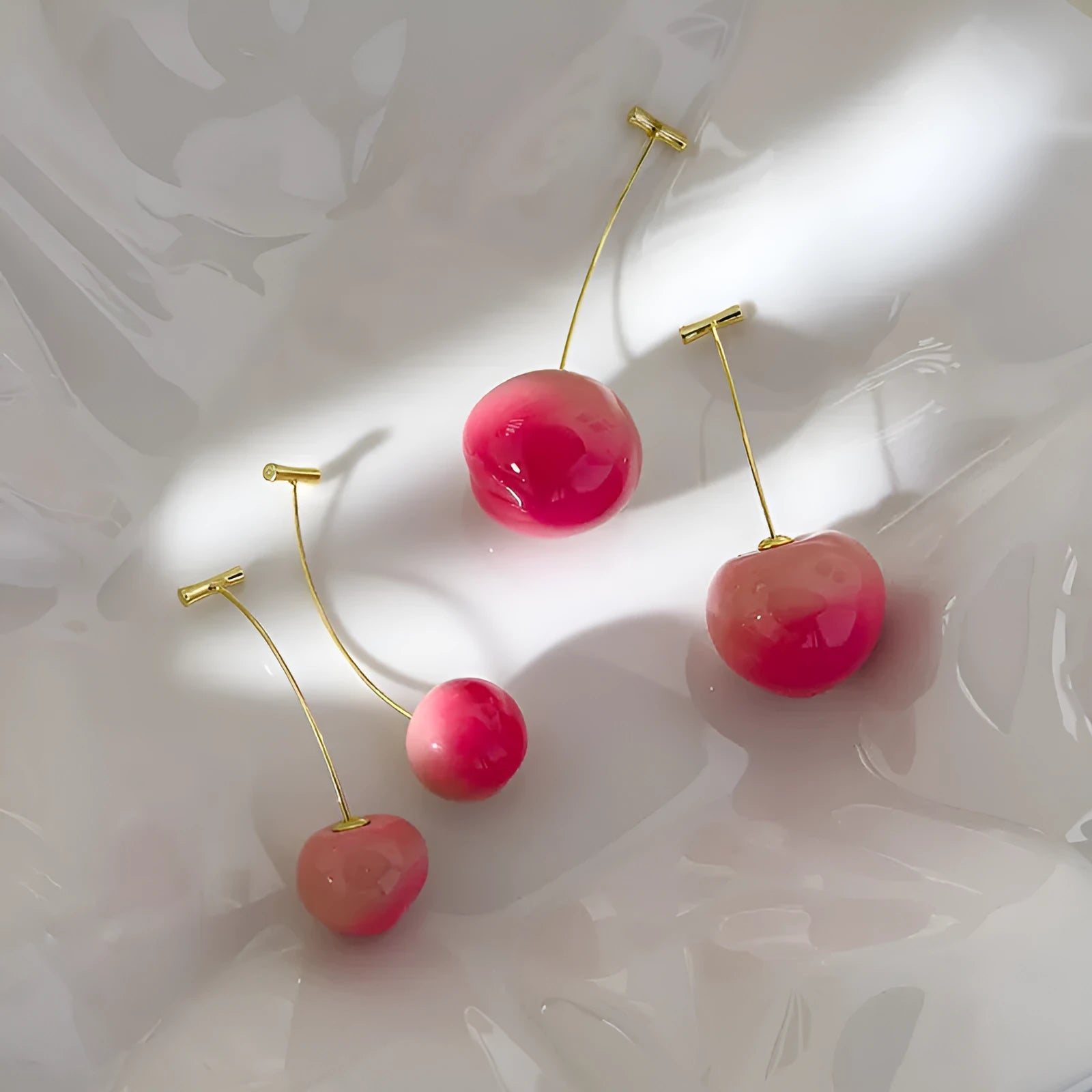 Transparent acrylic peach earrings with copper wires in small and large size options