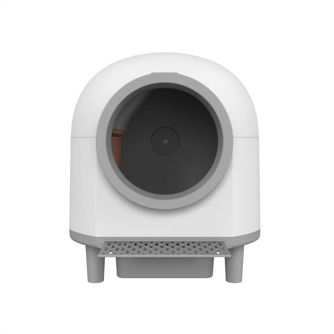 White automatic self-cleaning cat litter box with enclosed design measuring 556x512x590mm