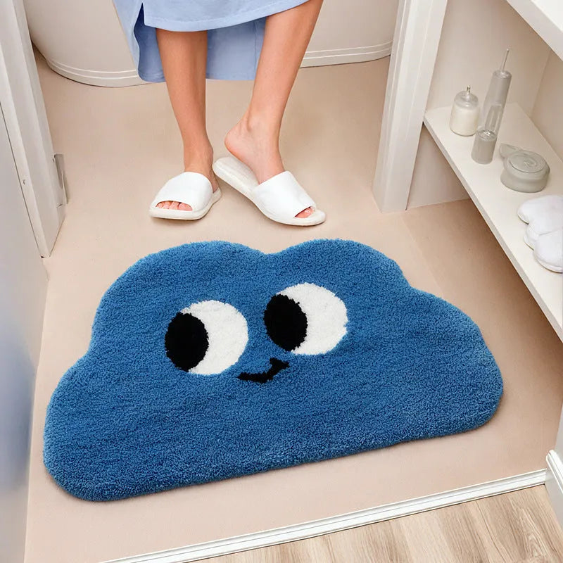Cartoon anime patterned bathroom mat in soft colours, available in multiple sizes on a bathroom floor.